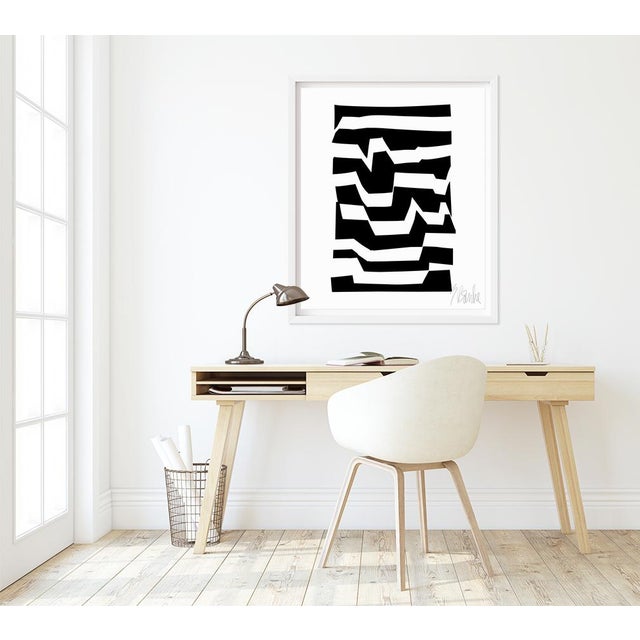 Liz created this piece in cut paper during a course she teaches called Bauhaus: Two Dimensional Design. One of the...