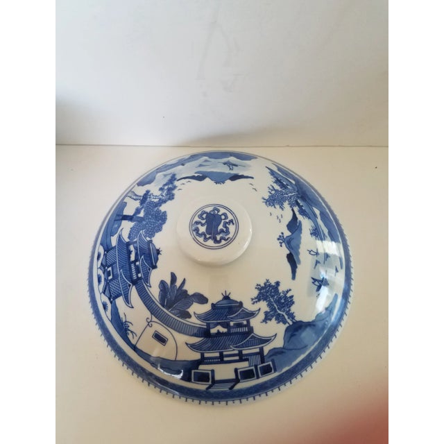 Vintage large Chinese covered ceramic casserole bowl. The bowl has two handles for easy handling. The blue & white motif...