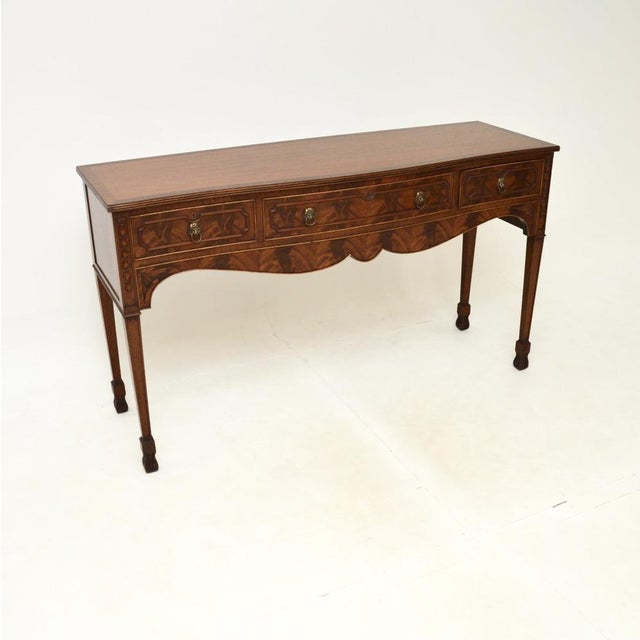 A beautiful antique console / server table in the Georgian style. This was made in England, it dates from around the...