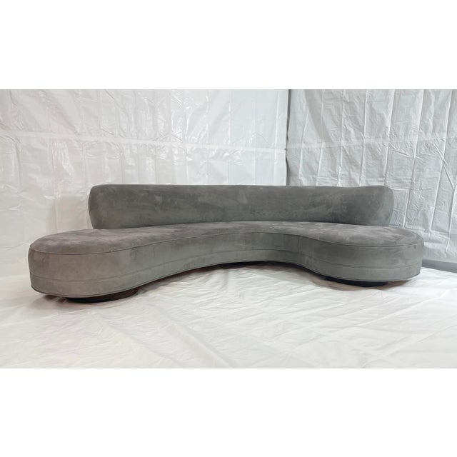 Vintage large serpentine sofa designed by Vladimir Kagan for Directional in the 1970s. This sculptural piece epitomizes...