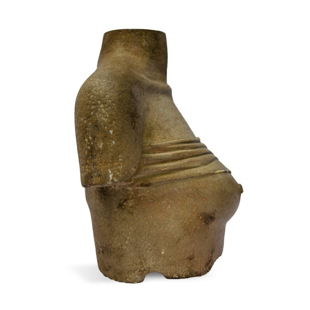 Unveiled Essence, a sandstone torso by Veit Korn, is a stunning exploration of form and material, sculpted from green reed...