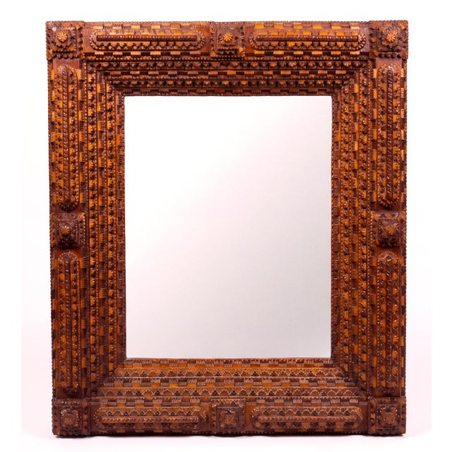 A true masterpiece of American folk art, this tramp art frame showcases the patience and skill that define the form at its...
