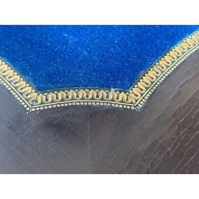 19th century Marquetry card table, the rectangular top centered with an inlaid cartouche and musical instruments, within...