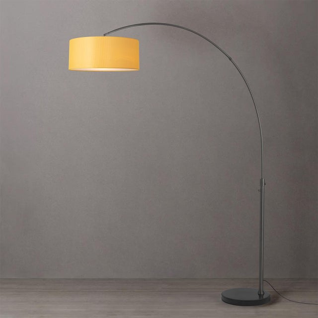 The Float Arc Lamp is a Modern arc lamp designed by Peter Morelli in 1960. It features a sleek black nickel steel body and...