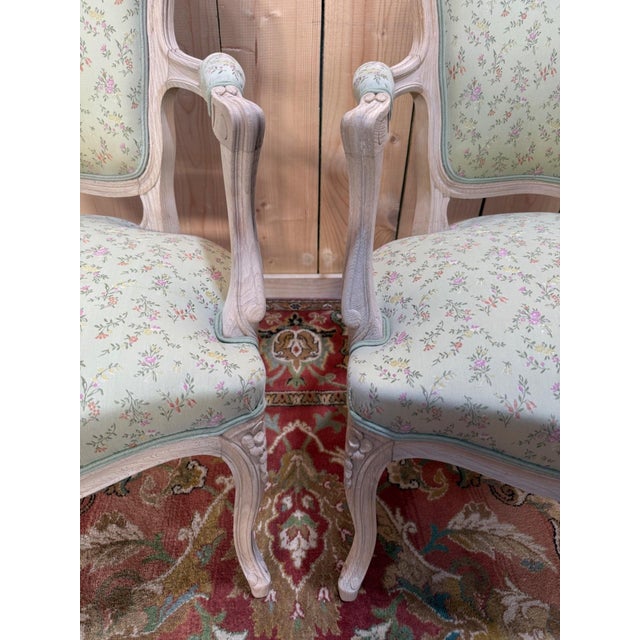 Pair of louis xv style cabriolet armchairs, frame in sandblasted beech with a raw finish revealing the natural wood grain....