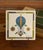 Bring a touch of vintage charm to your home with this original decorative metal tile featuring a colorful hot-air balloon...