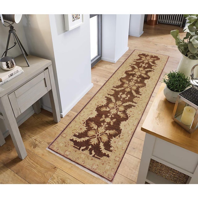 Enhance the ambiance of your home with this magnificent Persian-influenced Turkish hand-knotted rug made by skilled...