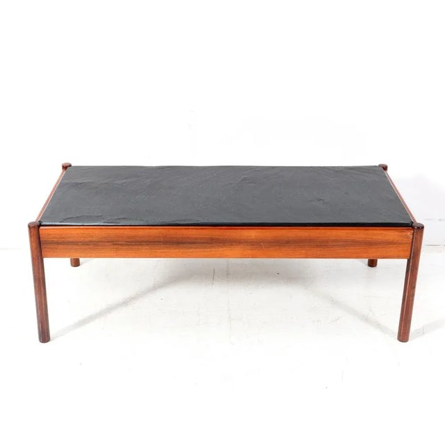 Stunning and elegant Mid-Century Modern coffee table or cocktail table. Striking Dutch design from the 1960s. Solid teak...