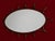 Iconic mid-century modern wall mirror. This piece is a large oval wall mirror, with a thick brass sunburst style surround....