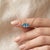 Cool down your style with this serene two-stone pendant necklace, featuring two sparkling sky-blue heart-shaped gemstones...