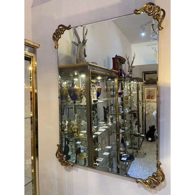 This stylish and chic mirror is very much in the manner of pieces created by Grosfeld House and the Hollywood Regency...