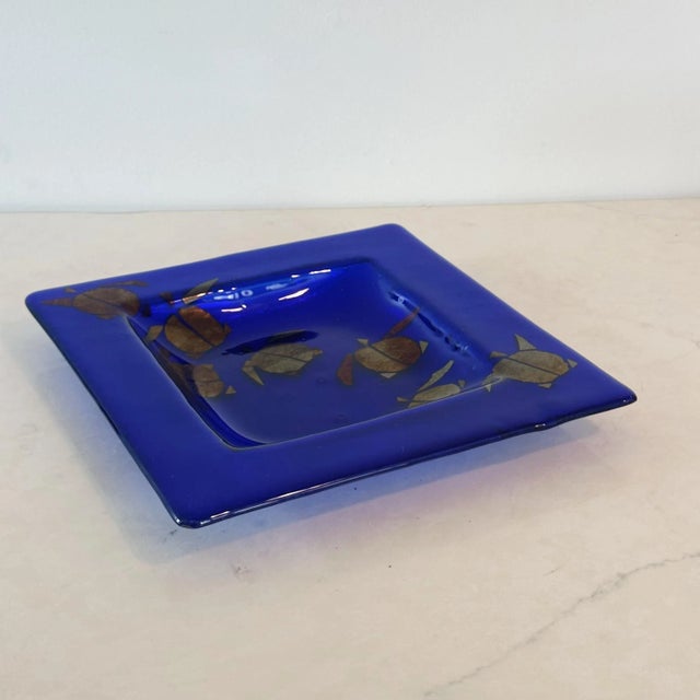 Vintage Trinket Dish Platter in Blue Glass With Gold Infused Sea-Turtles, Signed Measures approx: 11 x 11 x 1H Please...