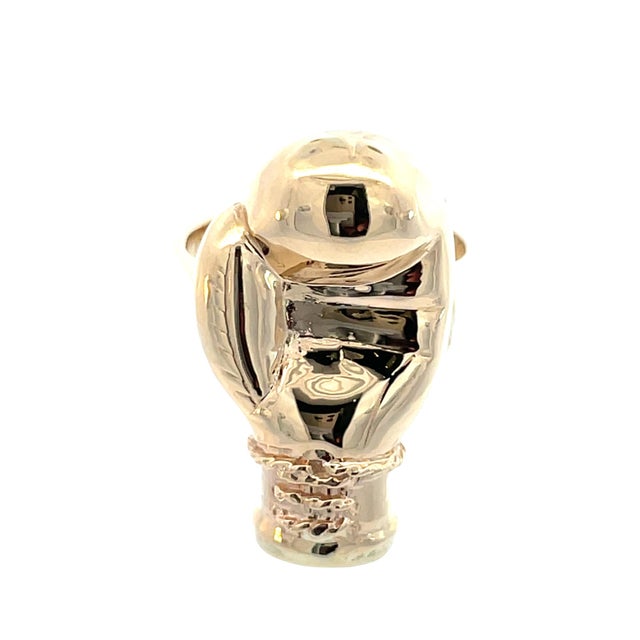 Bold vintage boxing glove ring crafted in 14K yellow gold (tested), featuring a detailed sculptural glove design with...