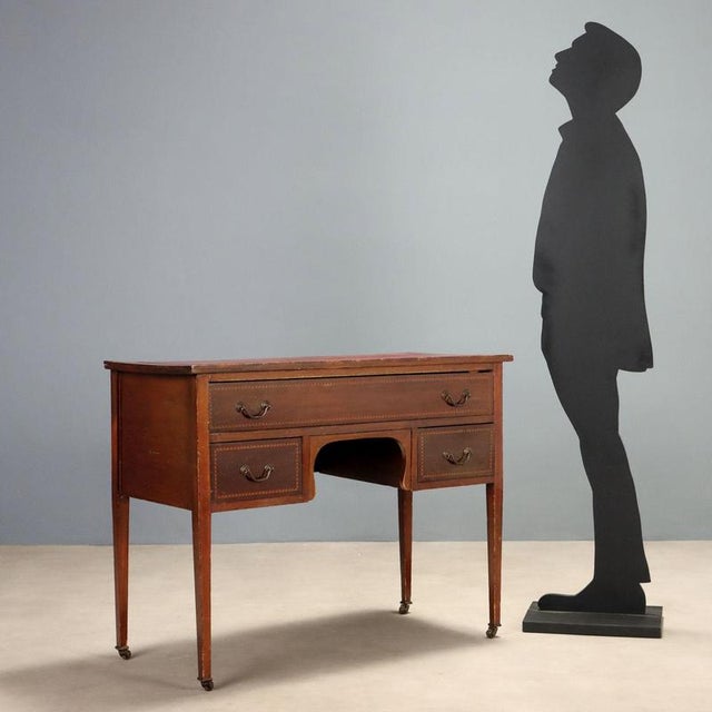Wall desk in classic style, crafted in England in the early 1900s, veneered in mahogany with refined ebony and maple...