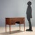 Wall desk in classic style, crafted in England in the early 1900s, veneered in mahogany with refined ebony and maple...