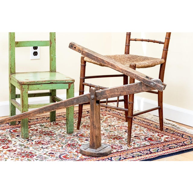 19th Century American Primitive Wooden Grain Scoop with Folding Support Arm & Iron Hanger An authentic 19th-century...