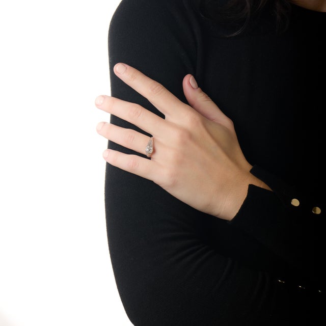 This refined Art Deco engagement ring is a beautiful expression of 1920s elegance, defined by balance, craftsmanship, and...