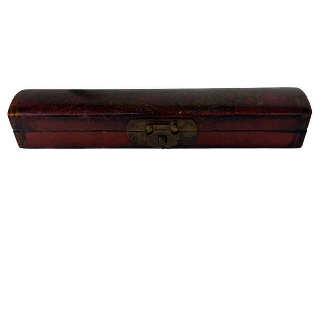 Vintage asian chinoiserie leather wrapped chop stick box. Features a gold design of a fire breathing dragon and phoenix in...