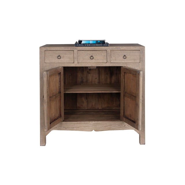 From the Le Monde collection, this [console table / media console / sideboard / credenza / dresser / bookcase / étagère]...