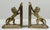 Regal vintage brass lion bookends in arched position on beveled brackets. Can be positioned with the lions facing up, or...