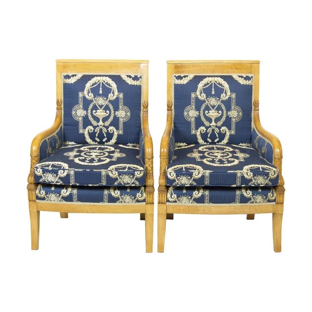 The pair of bergeres from the Empire / Biedermeier period was made of solid beech wood. The bergeres are completely...