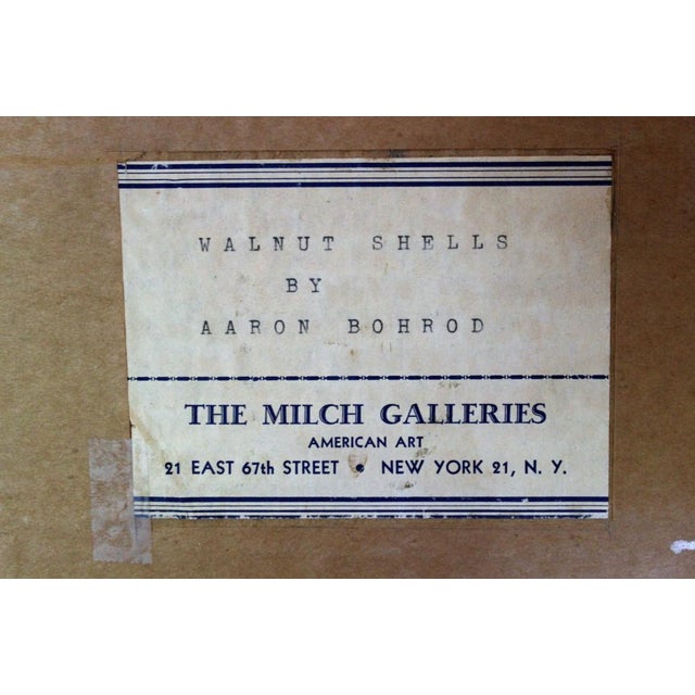 Original trompe l'oeil signed Aaron Bohrod (LL) entitled Walnut Shells Provenance: The Milch Galleries #21 East 67th...
