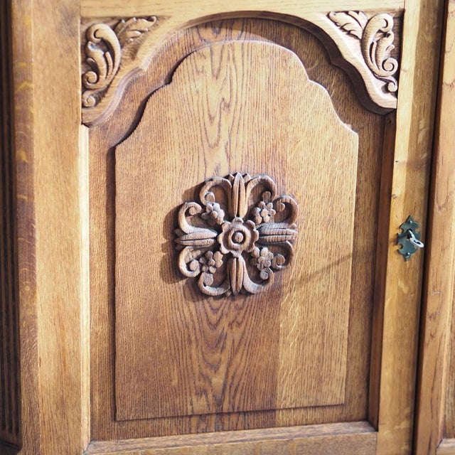 This solid oak sideboard was created around 1920 as a late historicist piece of furniture, incorporating neo-Baroque...