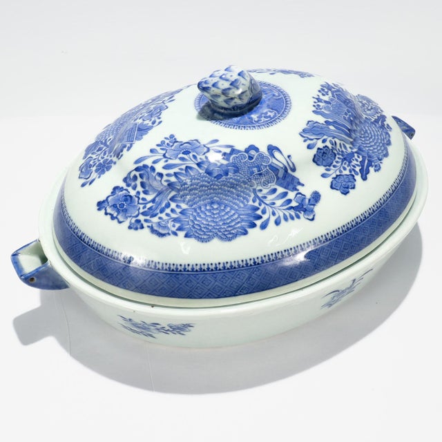 A fine antique Chinese export porcelain warming dish and lid. In the Fitzhugh pattern. Decorated in underglaze blue. With...