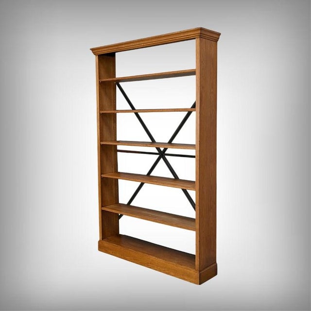 This 1940s oak shelf embodies the functional elegance characteristic of furniture from that era. Crafted from light oak,...