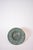 Circular neoclassical bronze plate, 1940s. Height: 3 cm - 1.18 in Diameter: 27 cm - 10.63 in