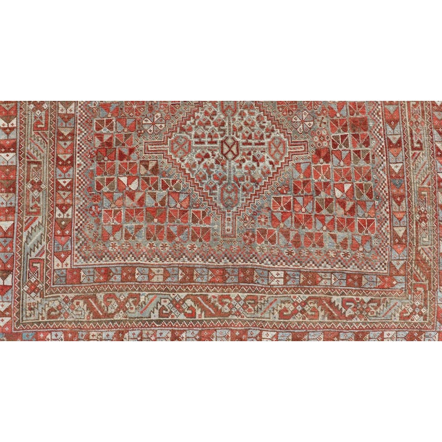 Textile Antique Distressed Persian Medallion Shiraz Rug in Shades Rusty Red & Steel Blue For Sale - Image 7 of 10