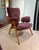 Pair of wooden and fabric lounge chairs by Roger Landault, France, circa 1950. Completely reupholstered in plum-colored...