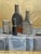 This is a small and very well executed od Still Life of Bottles Oil Painting on Canvas Board Signed. Signed by...