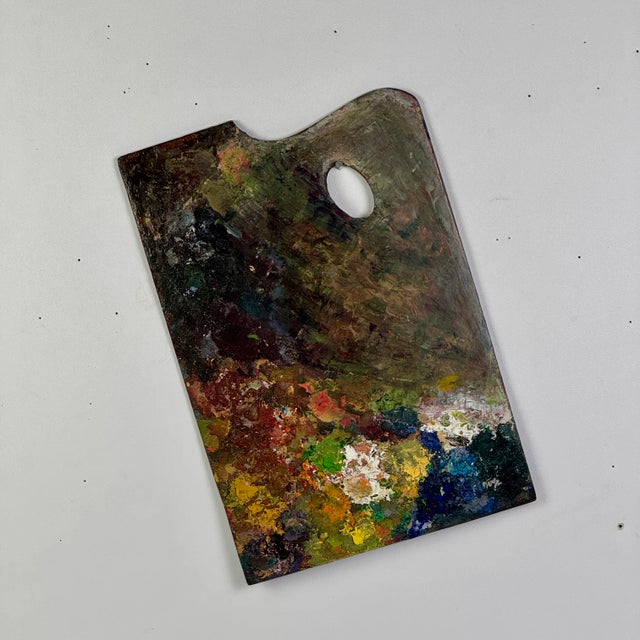 An original early 19th Century French artist's painting palette with remnant paint. One of the best additions to our...