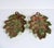A pair of mid-century Southern California ceramic leaf shape catchalls, glazed in a riot of mottled fall colors of deep...