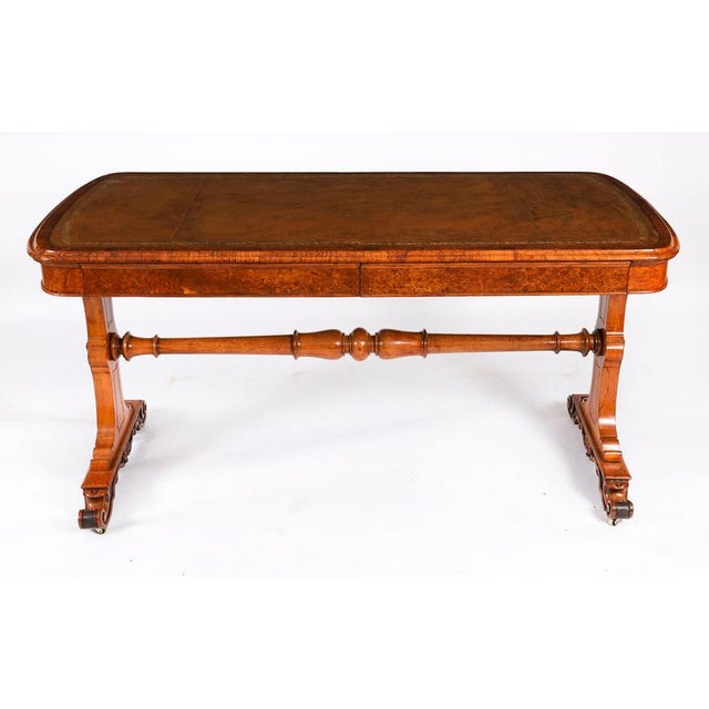 This gorgeous early Victorian antique writing table in the manner of Gillows was crafted from beautiful pollard oak and...