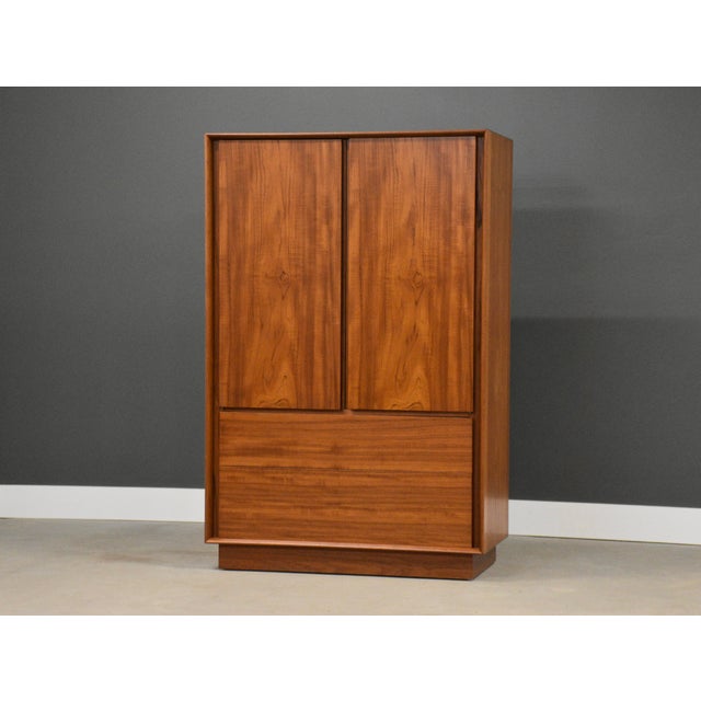 A mid century modern teak armoire with shelves and lots of drawer space. Made in Denmark. Circa 1960’s. Excellent original...