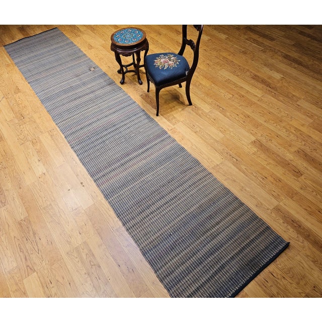 This beautiful vintage Amish rag runner is a rare surviving example of a distinctly American weaving tradition — one that...
