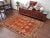 "Enhance the ambiance of your home with this magnificent Persian-influenced Turkish hand-knotted rug made by skilled...