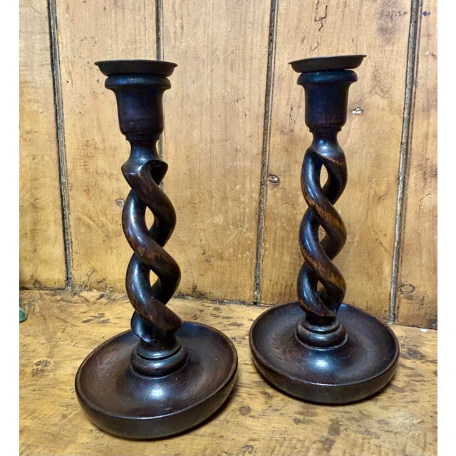 This pair of vintage English oak open barley twist candlestick holders carries with it the quiet poetry of candlelit rooms...