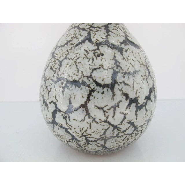 Japanese Studio Pottery Double Gourd Vase by Yanizawa Ryoeni. Dark Tenmoku style glaze with orange peel effect white over...