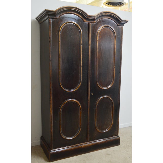 Tall Armoire by Guido Zichelle. Store item #544. It features one drawer and two adjustable shelves.