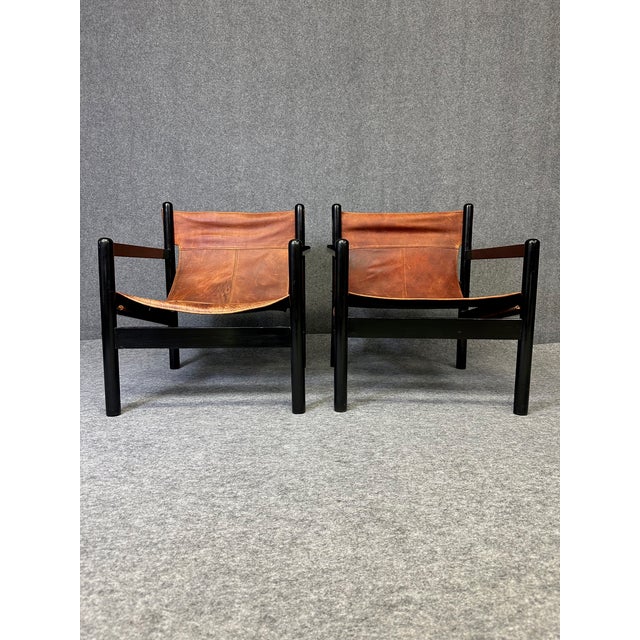 Safari Roxinho Style Armchairs Bring a touch of exotic luxury to your living space with this stunning pair of Safari...