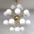 Italian sputnik chandelier with 24 matte white Murano glass globes mounted on brass frame in unlacquered natural brass...