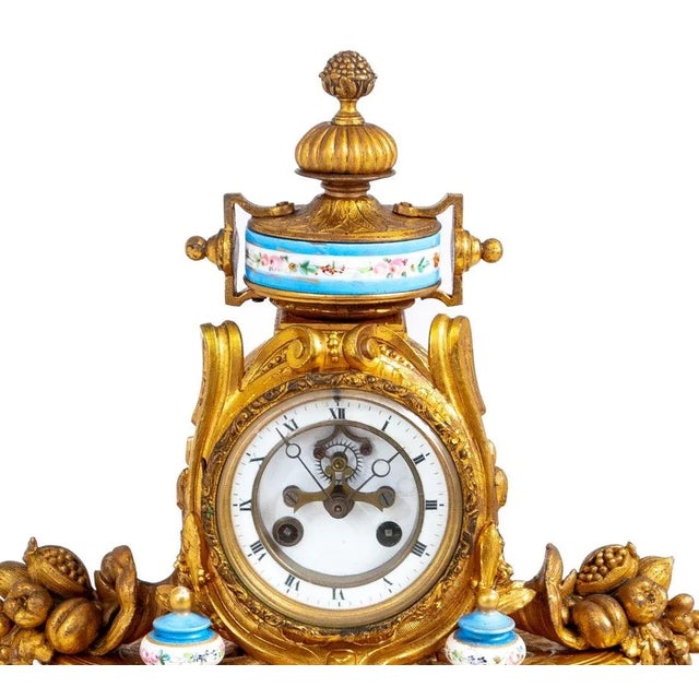 Louis XVI Style Gilt Metal and Sevres Porcelain Mounted Mantel Clock, late 19th century, the white enamel dial with open...