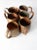 Set of six vintage solid copper mugs, circa 1930–1950, featuring classic cylindrical forms with rounded handles. This...