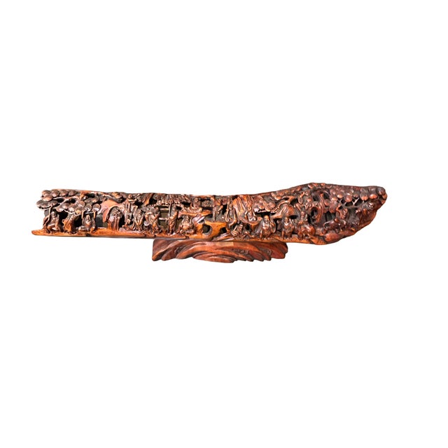 This exquisite hand-carved bamboo root sculpture depicts a lively assembly of the Eighteen Arhats (Luohan) traversing a...