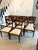 An antique English Regency style set of ten mahogany dining chairs, well made with elegant curved top rails and shaped...