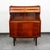 Outstanding Danish modern secretary desk in teak. Comes with sliding drawers and teak handles throughout + a slide out...