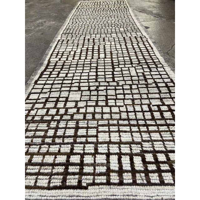 Hand-knotted Moroccan runner made by Aara Rugs Inc. This stunning allover design runner is made of 75% wool & 25% cotton,...